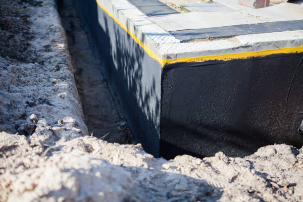 Professional Emergency Waterproofing technician working in Brookhaven, GA